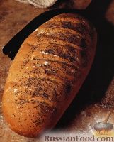 Фото к рецепту: Дрожжевой хлеб с маком в виде батона