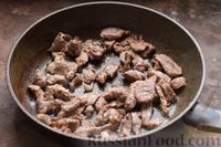 Фото приготовления рецепта: Свинина, жаренная с овощами и грибами, с соевым соусом - шаг №5