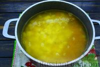 Фото приготовления рецепта: Суп с крабовыми палочками, рисом и кукурузой - шаг №7