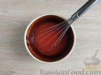 Фото приготовления рецепта: Ленивые голубцы с квашеной капустой, запечённые в томатном соусе - шаг №12