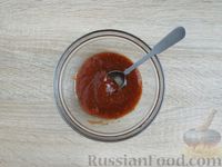 Фото приготовления рецепта: Скумбрия, запечённая в томатном маринаде - шаг №7
