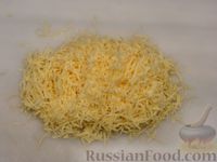 Фото приготовления рецепта: Морковно-сырный рулет с куриным фаршем - шаг №3