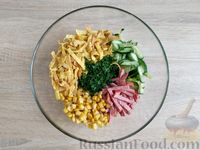 Фото приготовления рецепта: Салат с колбасой, огурцами, кукурузой и яичными блинчиками - шаг №10