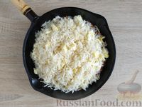 Фото приготовления рецепта: Рис с куриным фаршем и омлетом (на сковороде) - шаг №18