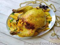 Фото к рецепту: Запечённая курица в духовке, фаршированная айвой