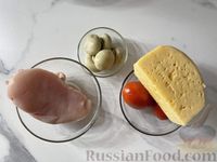 Фото приготовления рецепта: Куриное филе с шампиньонами, помидорами и сыром, в духовке - шаг №1
