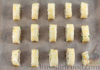 Фото приготовления рецепта: Слоёные рулетики с ветчиной, сыром и чесноком - шаг №12