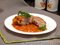 Фото приготовления рецепта: Куриные бёдрышки, тушенные в томатно-соевом соусе - шаг №14
