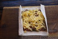 Фото приготовления рецепта: Рулетики из лаваша, с фаршем и сыром (в духовке) - шаг №11