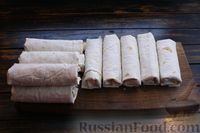 Фото приготовления рецепта: Рулетики из лаваша, с фаршем и сыром (в духовке) - шаг №13