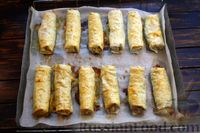 Фото приготовления рецепта: Рулетики из лаваша, с фаршем и сыром (в духовке) - шаг №16