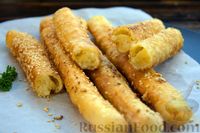Фото приготовления рецепта: Жареные палочки из картофельного пюре, с кунжутом (во фритюре) - шаг №17