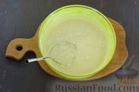 Фото приготовления рецепта: Заливной пирог с тушёнкой и сыром, на кефире - шаг №8