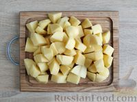 Фото приготовления рецепта: Картофель, тушенный в сметане - шаг №4