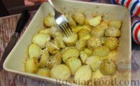 Фото к рецепту: Картофель, запечённый в духовке, с сыром