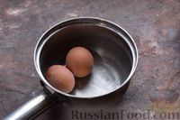Фото приготовления рецепта: Тарталетки из лаваша с яйцом и шпротами - шаг №7