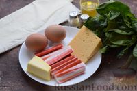 Фото приготовления рецепта: Рулетики из теста фило, с крабовыми палочками, шпинатом, яйцами и сыром - шаг №1