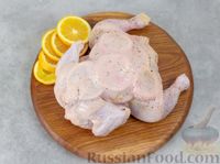 Фото приготовления рецепта: Курица, запечённая с апельсинами - шаг №4