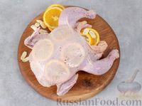 Фото приготовления рецепта: Курица, запечённая с апельсинами - шаг №5