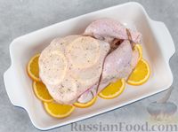 Фото приготовления рецепта: Курица, запечённая с апельсинами - шаг №7