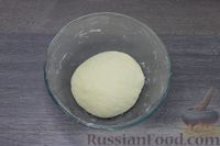 Фото приготовления рецепта: Дрожжевые пирожки с яйцом и зелёным луком (в духовке) - шаг №12