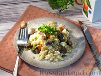 Фото приготовления рецепта: Рис с куриными сердечками и замороженными овощами - шаг №13