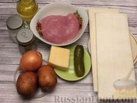Фото приготовления рецепта: Открытые слоёные пирожки с картошкой, куриным филе, солёными огурцами и сыром - шаг №1