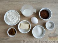 Фото приготовления рецепта: Шоколадные кексы с изюмом, глазурью и кокосовой посыпкой - шаг №1