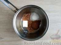 Фото приготовления рецепта: Шоколадные кексы с изюмом, глазурью и кокосовой посыпкой - шаг №13