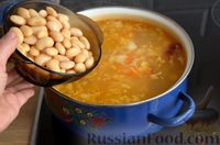 Фото приготовления рецепта: Зганянка (суп с копчёными рёбрышками, квашеной капустой и фасолью) - шаг №11
