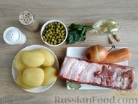 Фото приготовления рецепта: Свиные рёбрышки, тушенные с картошкой и консервированным горошком - шаг №1