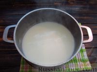 Фото приготовления рецепта: Жидкая овсяная каша на молоке - шаг №3