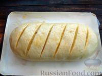Фото приготовления рецепта: Домашний хлеб-батон на молоке и сливочном масле - шаг №14