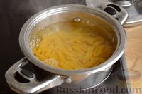 Фото приготовления рецепта: Макароны с ветчиной в сливочно-томатном соусе - шаг №2