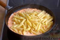Фото приготовления рецепта: Макароны с ветчиной в сливочно-томатном соусе - шаг №9
