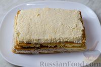 Фото приготовления рецепта: Закусочный торт "Нептун" с рыбными консервами, сыром и крекерами - шаг №13