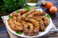 Фото к рецепту: Тушёные куриные шейки с луком