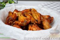 Фото к рецепту: Запечённые куриные крылышки в духовке