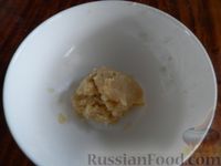 Фото приготовления рецепта: Слоёно-песочное печенье "Лотосы" с кокосовой начинкой - шаг №9