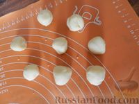Фото приготовления рецепта: Слоёно-песочное печенье "Лотосы" с кокосовой начинкой - шаг №14