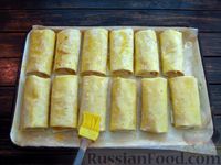 Фото приготовления рецепта: Рулетики из лаваша с творожно-морковной начинкой (в духовке) - шаг №17