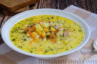 Фото к рецепту: Сырный суп с куриным филе и консервированной кукурузой