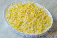 Фото приготовления рецепта: Рыбная запеканка с рисом и сыром - шаг №9