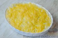 Фото приготовления рецепта: Рыбная запеканка с рисом и сыром - шаг №10