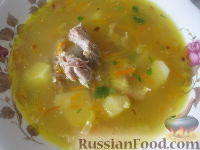 Фото к рецепту: Гороховый суп со свиными ребрышками