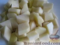 Фото приготовления рецепта: Суп с рисом, шампиньонами и плавленым сыром - шаг №3