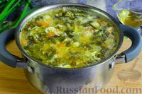 Фото приготовления рецепта: Щавелевый суп с фрикадельками и яйцами - шаг №14
