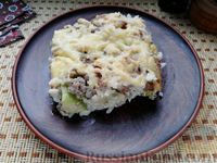 Фото к рецепту: Запеканка из кабачков с фаршем, рисом, грибами и сыром