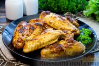 Фото приготовления рецепта: Куриные крылышки, запечённые в томатно-майонезном соусе - шаг №9