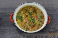 Фото приготовления рецепта: Кабачковый суп с колбасой и плавленым сыром - шаг №10